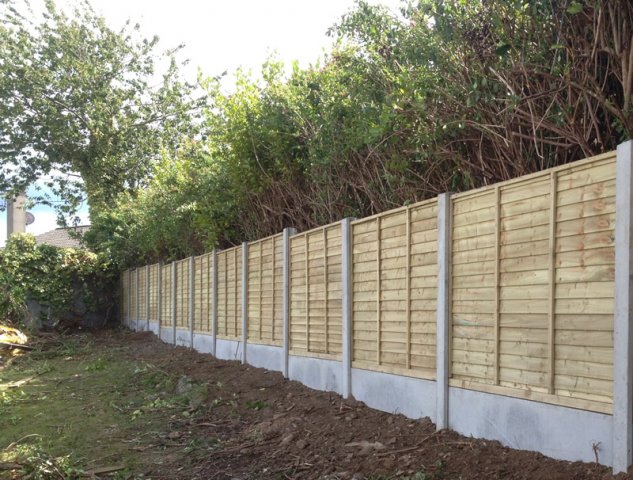 Pressure Treated Overlap Panels in Concrete Posts and Concrete Gravel Boards