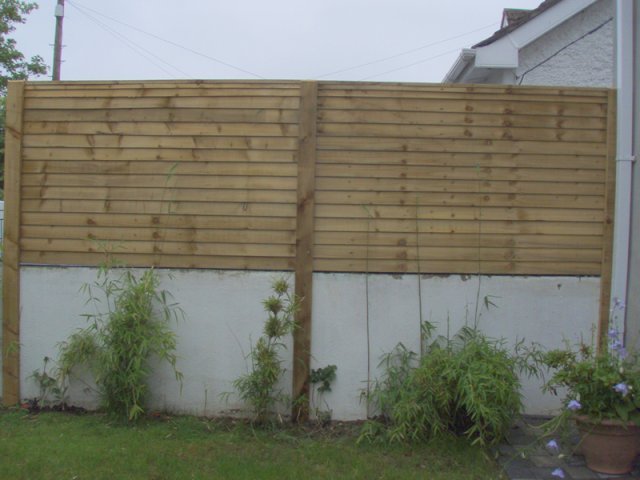 Overlap Panels on Top of Wall fitted on Battens expressed bolted to wall