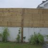 Overlap Panels on Top of Wall fitted on Battens expressed bolted to wall